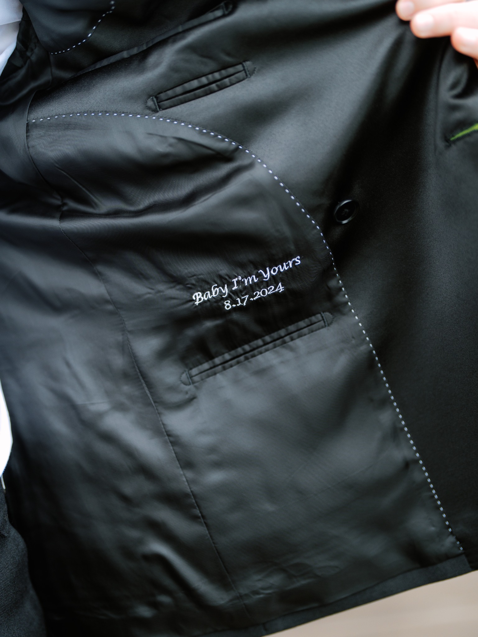 Personal embroidery inside a bespoke tuxedo
