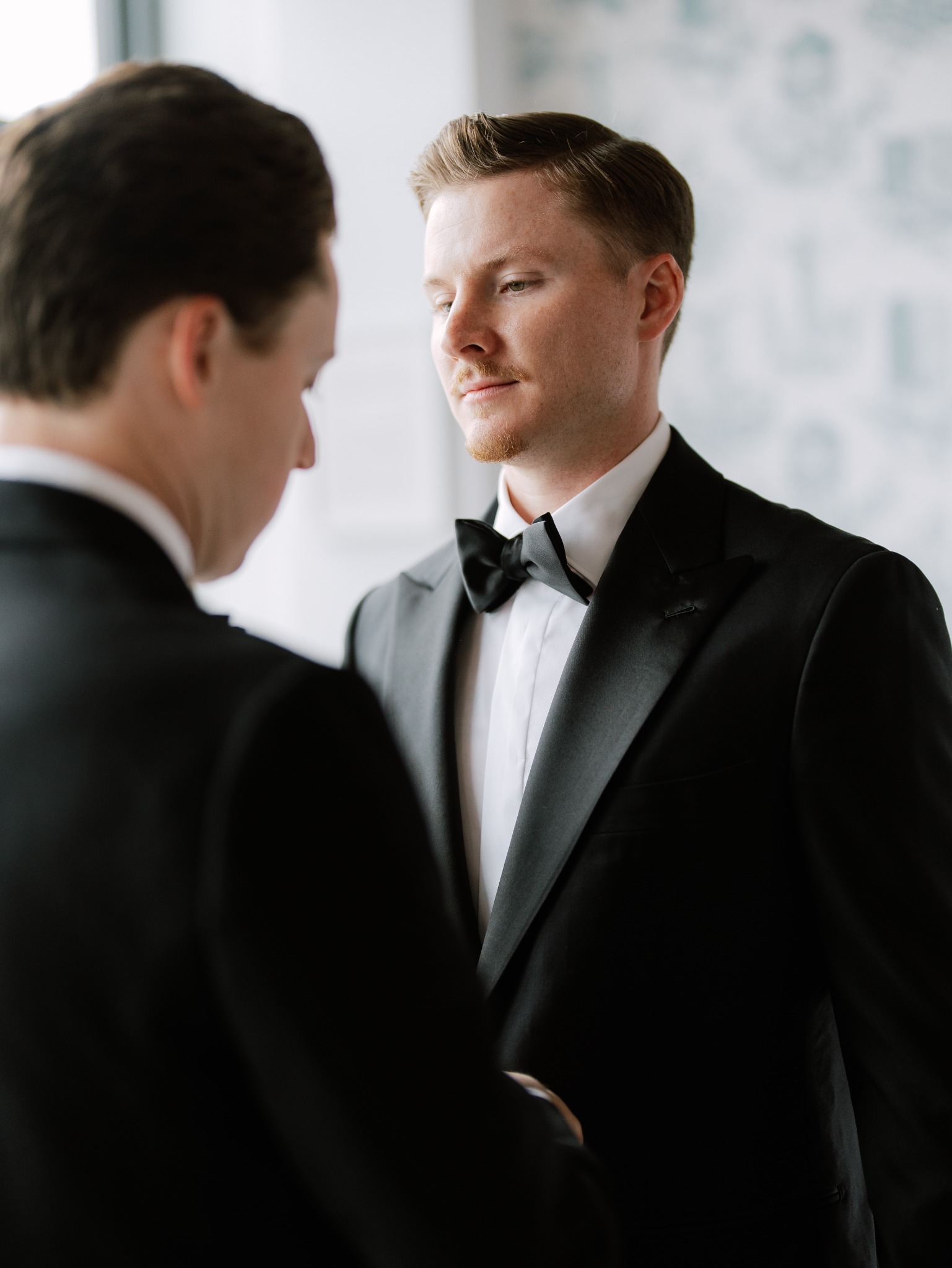 Portrait showing the tuxedo's lapels and silhouette